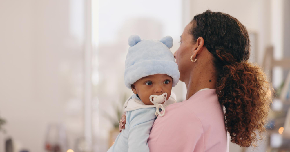 Mother considering whether postpartum depression screening may be useful